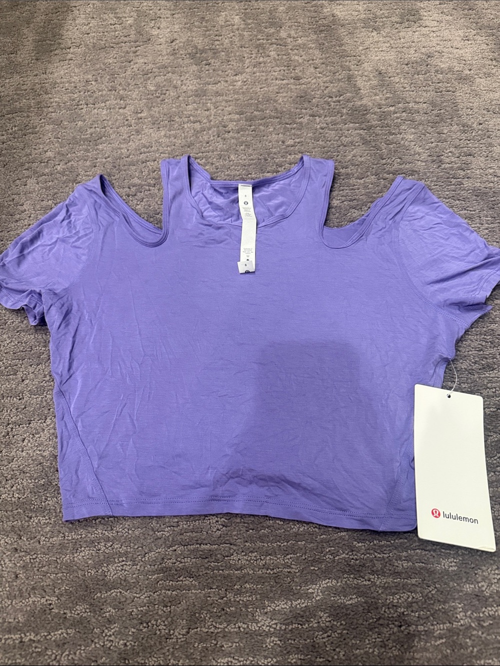 Lululemon top NWT size 8 .